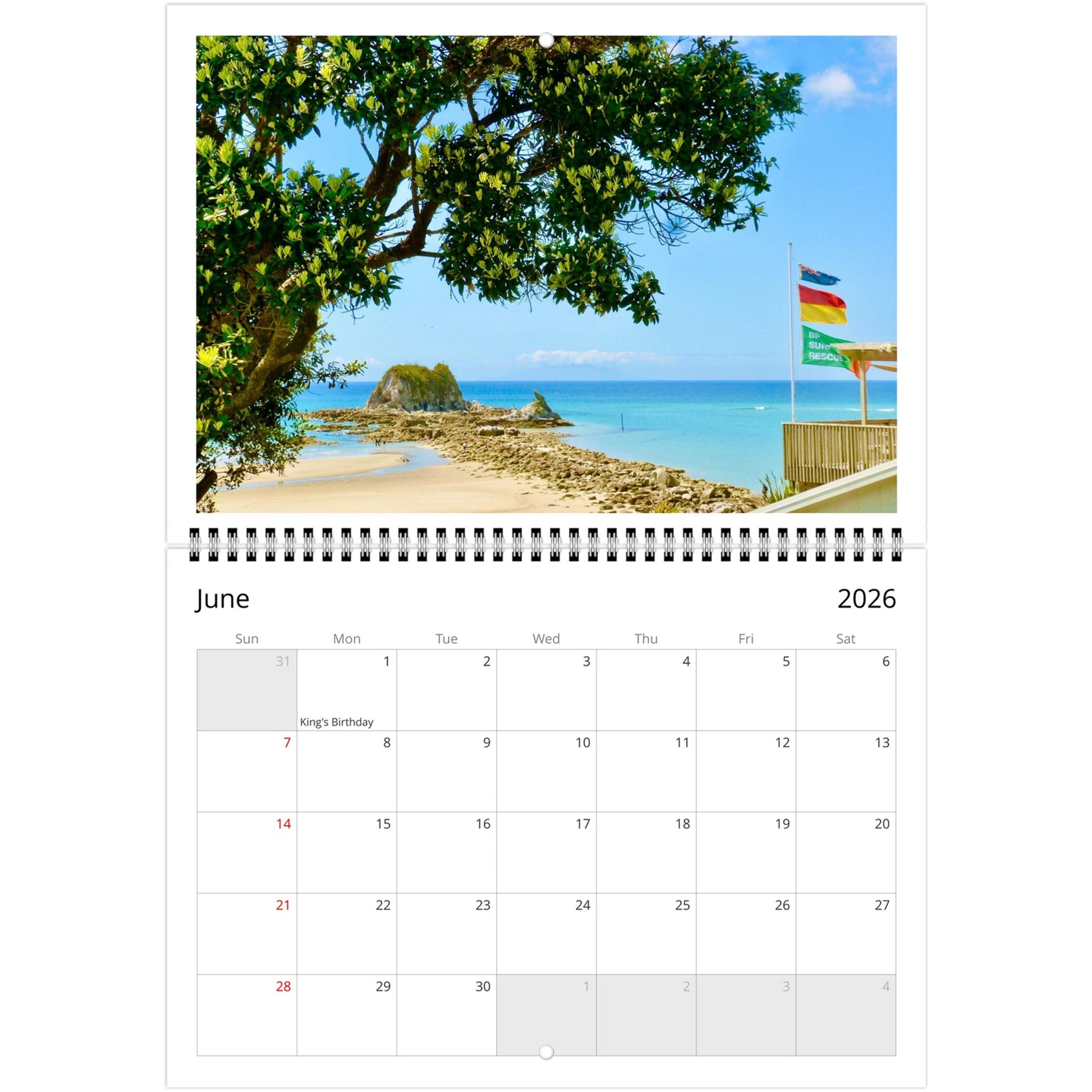 Calendar with scenic images of beaches and landscapes on a white background, Mangawhai 2026 calendar mockup, wall calendar display, new zealand photography calendar, office decor, piwaka prints
